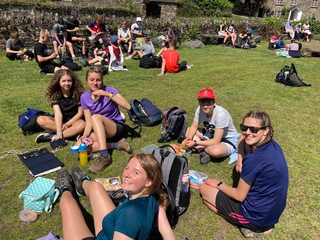 Students take a break during DofE expedition.